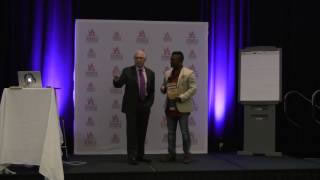 K. Raj Singh receives book award on stage by Raymond Aaron | TEDx Speaker